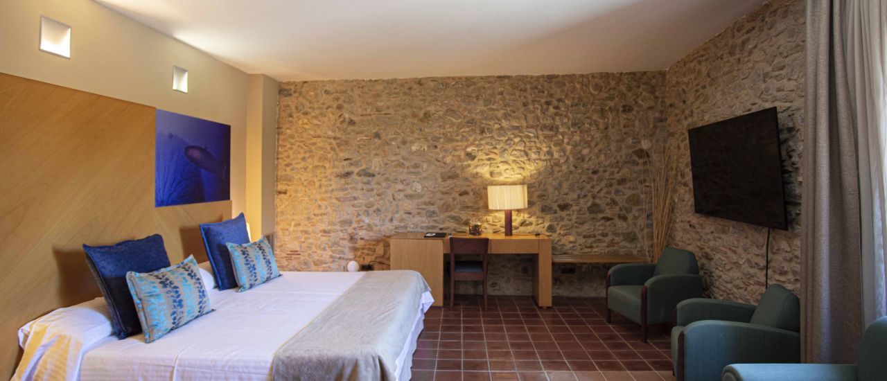Habitación dentro de la masía - Hotel Arcs de Monells